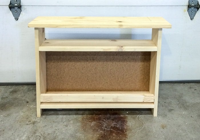Completed DIY kids bedside table with book storage