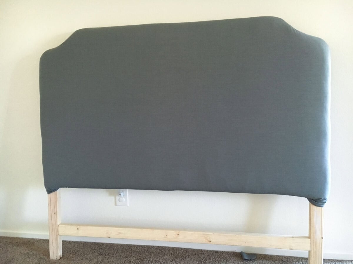 DIY Upholstered headboard in grey fabric ready for the nailhead trim.