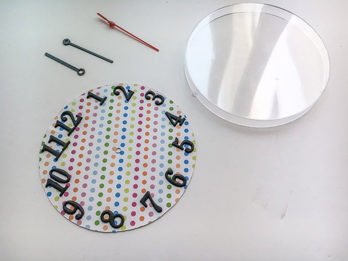Ikea Rusch wall clock face made from scrapbook paper and clock numbers