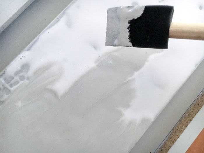 Adding top paint layer on glue to make crackle paint effect