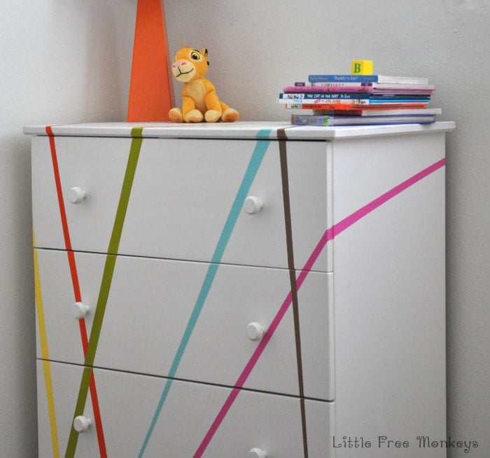 A fun, whimsical and colorful makeover for the Ikea Tarva dresser. Perfect for a gender neutral Kids room or a baby's nursery