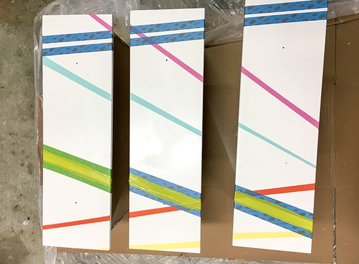 Colorful stripes painted on Ikea Tarva dresser drawers. with masking tape for next layer