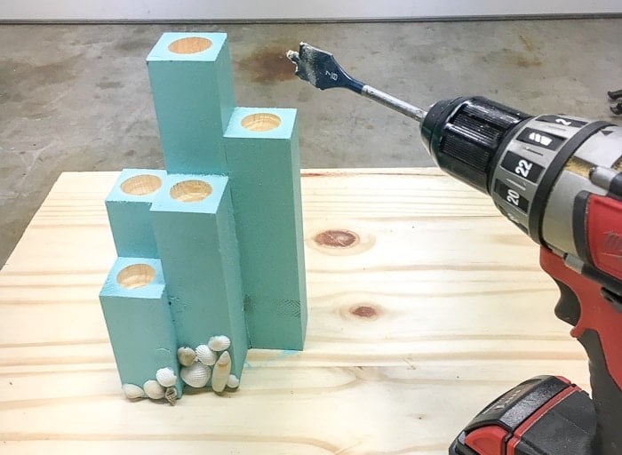 Making holes in DIY scrap wood candle holder