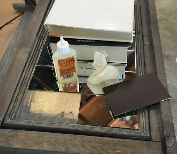 DIY Mirrored Console table- attach mirrors to the drawer face