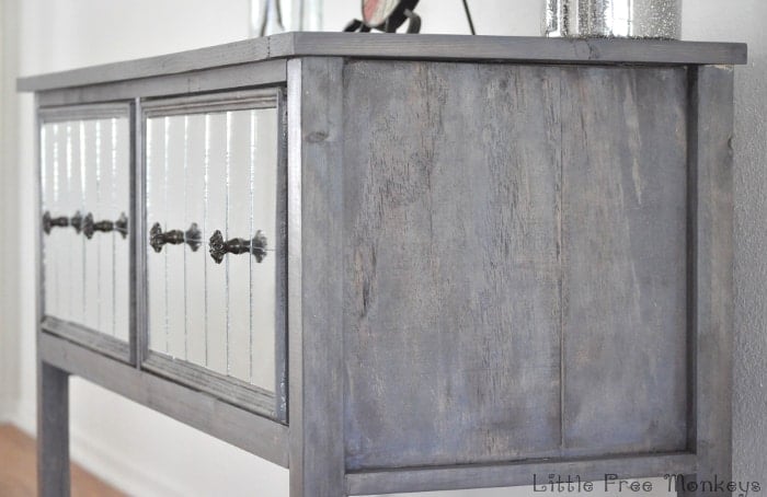 Build your own DIY mirrored console table! Step by step tutorial on how to build this amazing rustic weathered furniture
