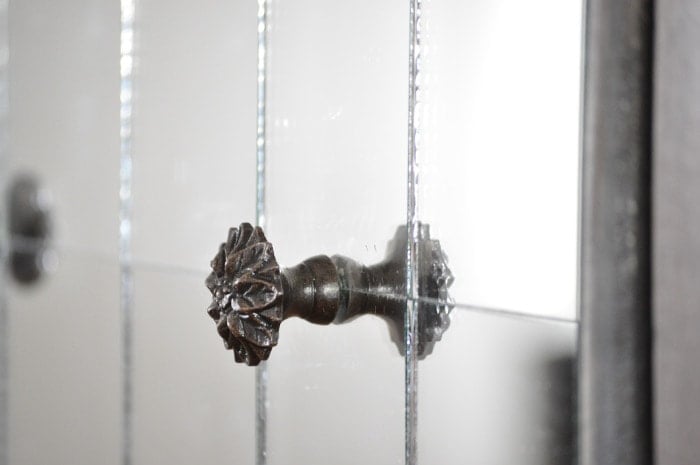 DIY Mirrored Console table- pretty knobs!