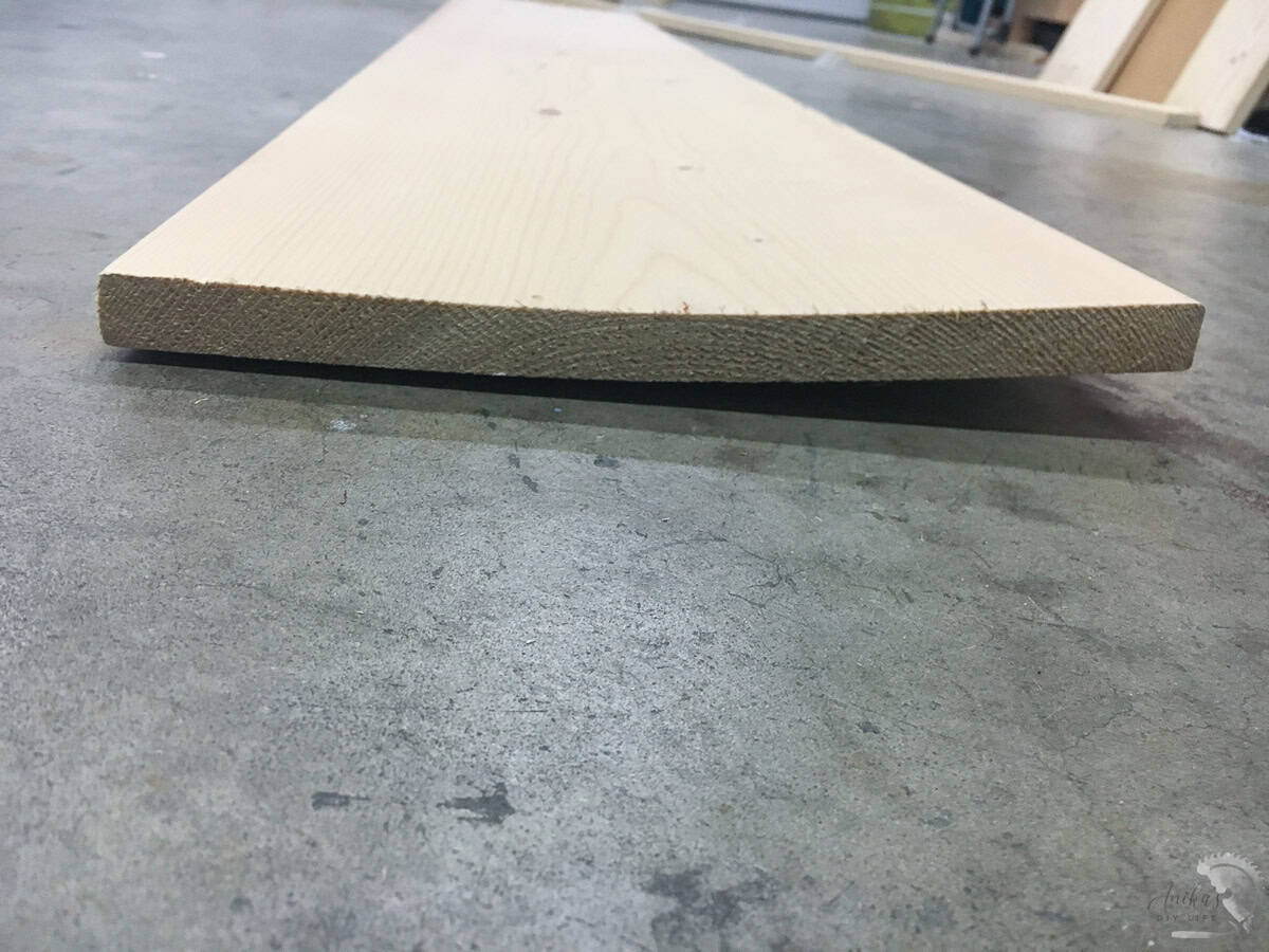 close up of edge of board showing warp