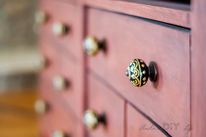These knobs on the faux apothecary cabinet are just amazing!