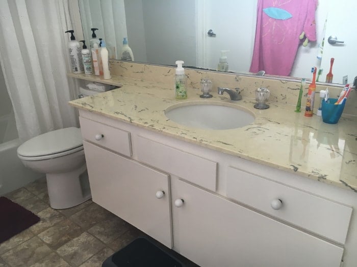 This vanity really needs an update! see how I did it for under $100 and it is all removable!