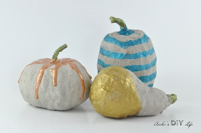 Paint dripped DIY concrete pumpkins - so easy to make!