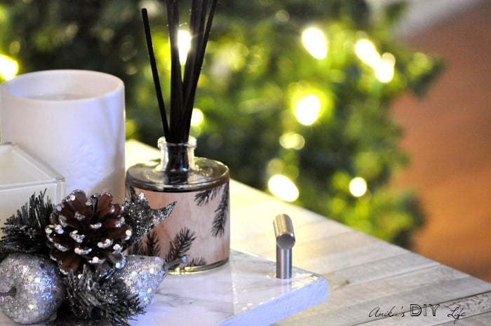 She shows you how to make this beautiful centerpiece with a DIY marble tray! 