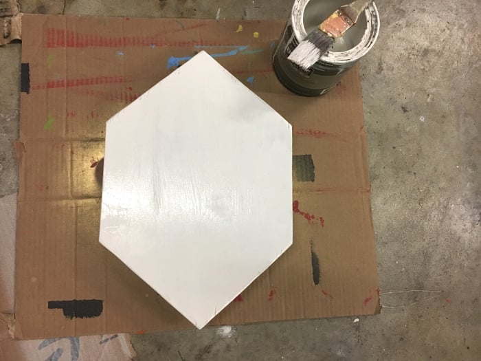 She created a faux marble tray out of a painted piece of wood!