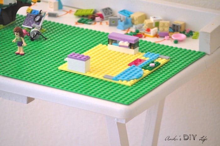 Portable DIY Lego table. An old TV table makeover never looked so cute!