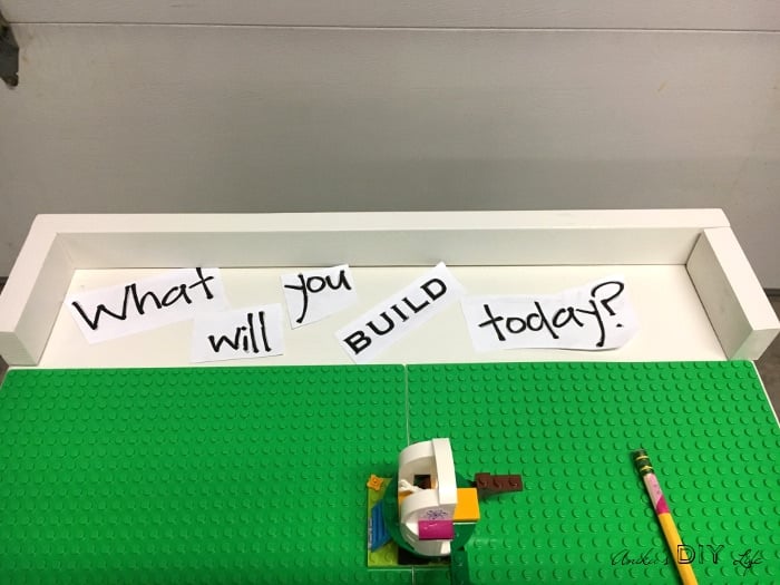 A portable DIY Lego table made from an old TV table