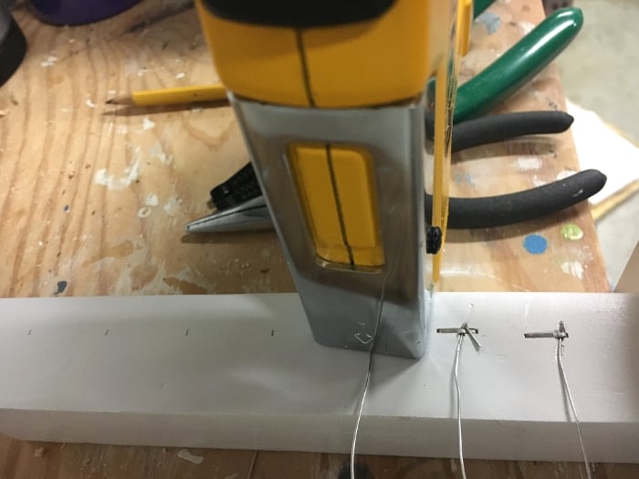 She is making a DIY jewelry holder! I can't believe how easy and simple it is!