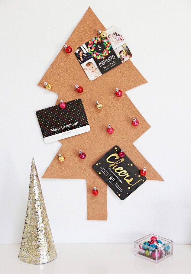 Organize all the Christmas cards and make them look like pretty decor with all these Christmas card display ideas!