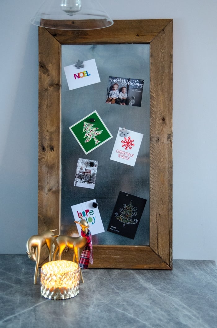 Organize all the Christmas cards and make them look like pretty decor with all these Christmas card display ideas!