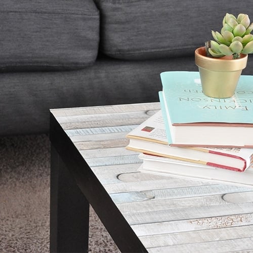 This Ikea Lack coffee table makeover is the easiest you will ever see! The plain table top can be easily transformed into your favorite farmhouse look with this simple hack that takes about 5-minutes!