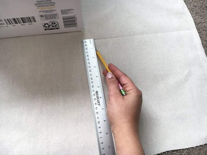 How to make perfect no-sew canvas storage bins by wrapping cardboard boxes in drop cloth. This is a fun easy drop cloth organization project