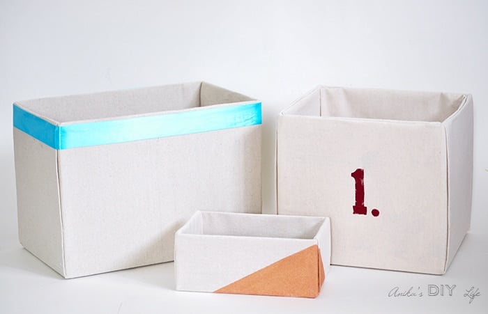 How to make perfect no-sew canvas storage bins by wrapping cardboard boxes in drop cloth. This is a fun easy drop cloth organization project