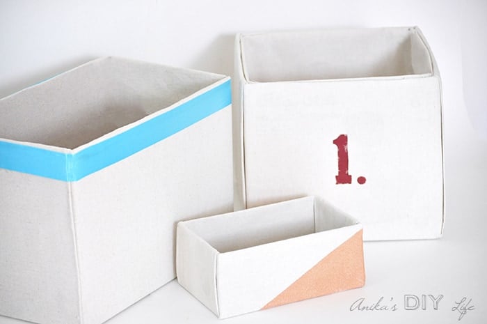 How to make perfect no-sew canvas storage bins by wrapping cardboard boxes in drop cloth. This is a fun easy drop cloth organization project