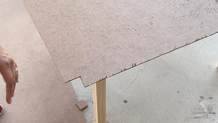 cutting ends of bottom of the kids storage desk