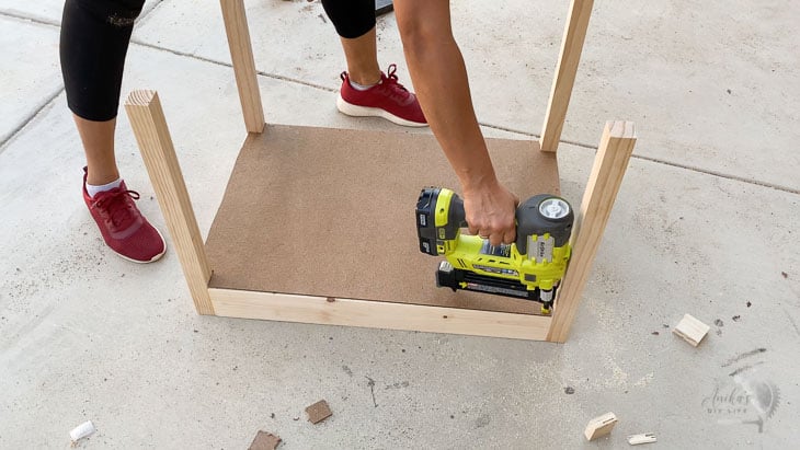 attaching base of kids desk with storage