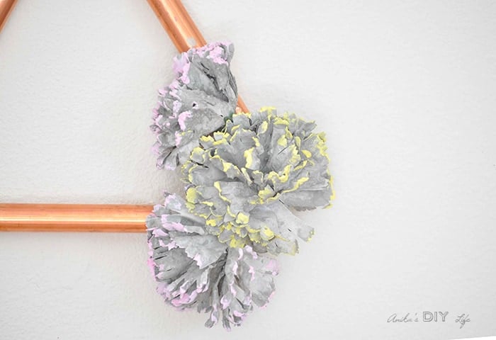 Modern copper wreath or wall decor using copper pipes and concrete flowers