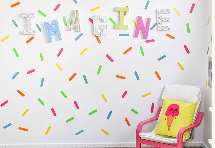 Create a sprinkles accent wall for a colorful playroom decor idea
