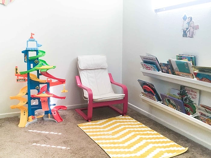 Check out how she made over this oplain corner into a fun colorful playroom!