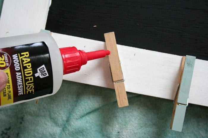 attach clothespins to create a fun laundry room art