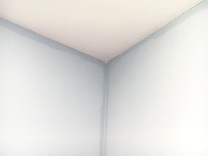 How to fix uneven wall paint color - picture framing or hatbanding issue