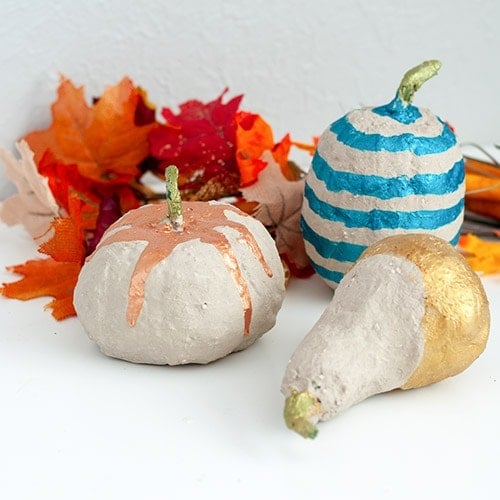 Easy DIY Concrete pumpkins using dollar store pumpkins