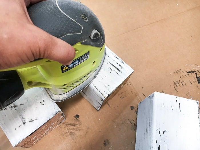 Distressing the wood block snowman blocks