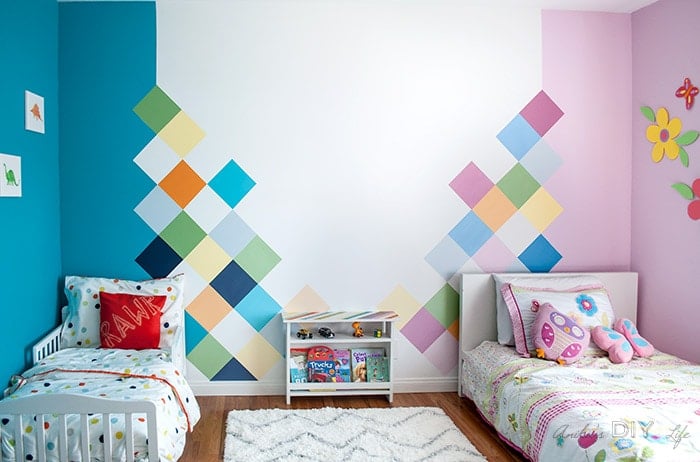 This boy-girl shared bedroom is so amazing! It shows each kids personality so well!