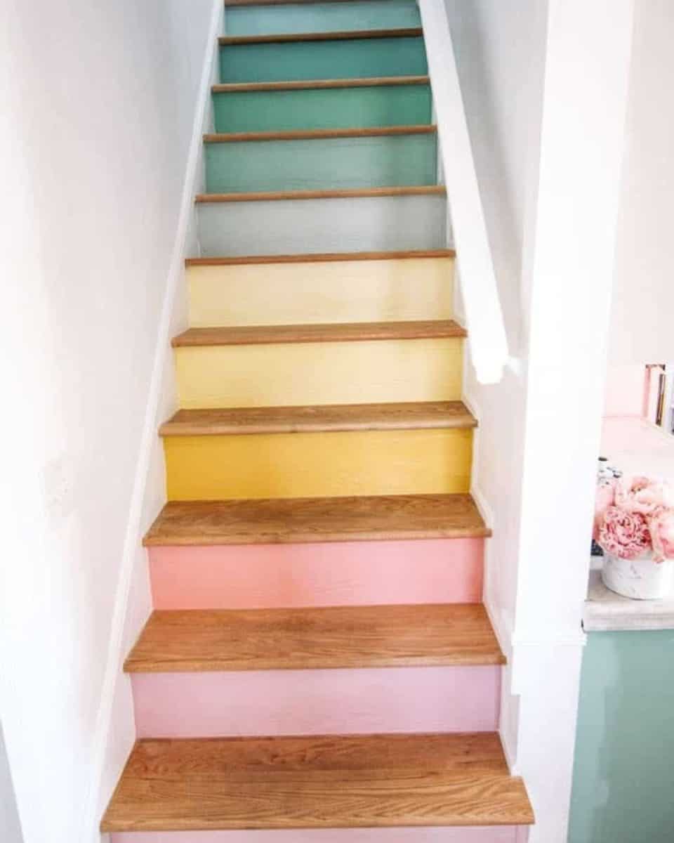 Stair risers painted in rainbow colors