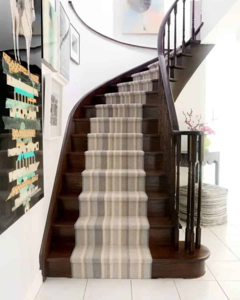 staircase with dark stain and rug runner