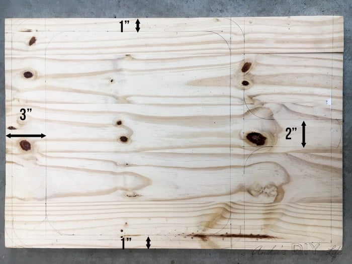 Wood plank showing measurements to cut out the cutting board design