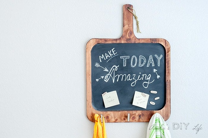 Cutting board shaped magnetic chalkboard with hooks, doodle, and rock magnets