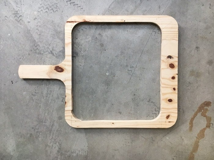 Cut out of the cutting board shape. The center has been cut out too.