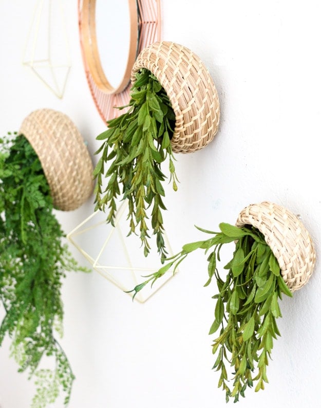 Ikea basket hanging planter hack filled with green plants