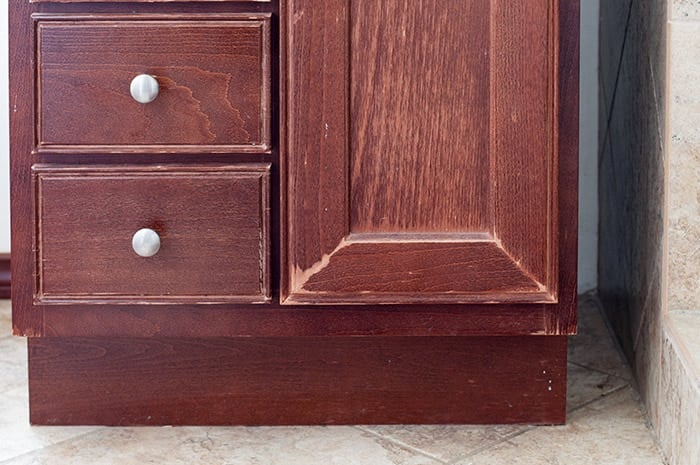 BEfore of the moisture damage on the vanity.