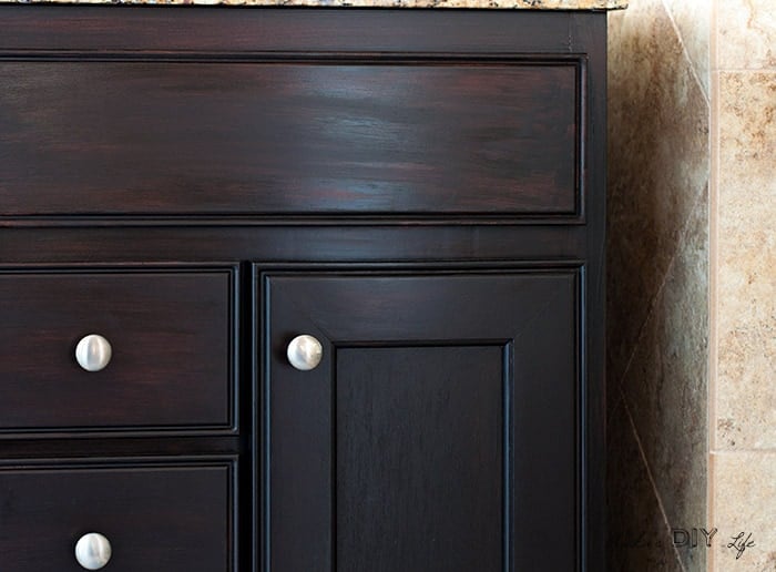 Close up view of old cabinets updated with gel stain