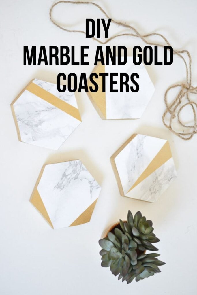 4 diy hexagonal marble and gold coasters laying next to a succulent and twine