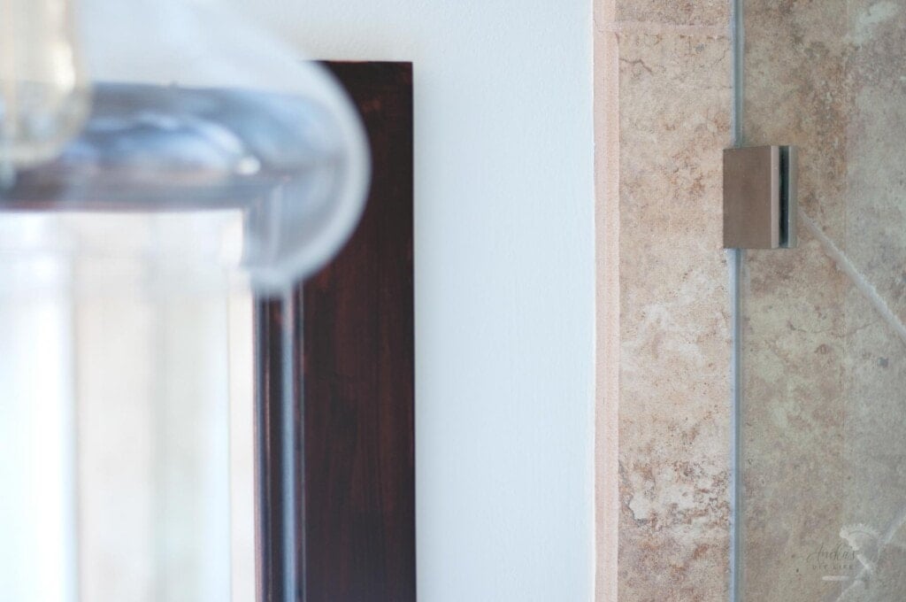 close up of the edges between the tile and wall