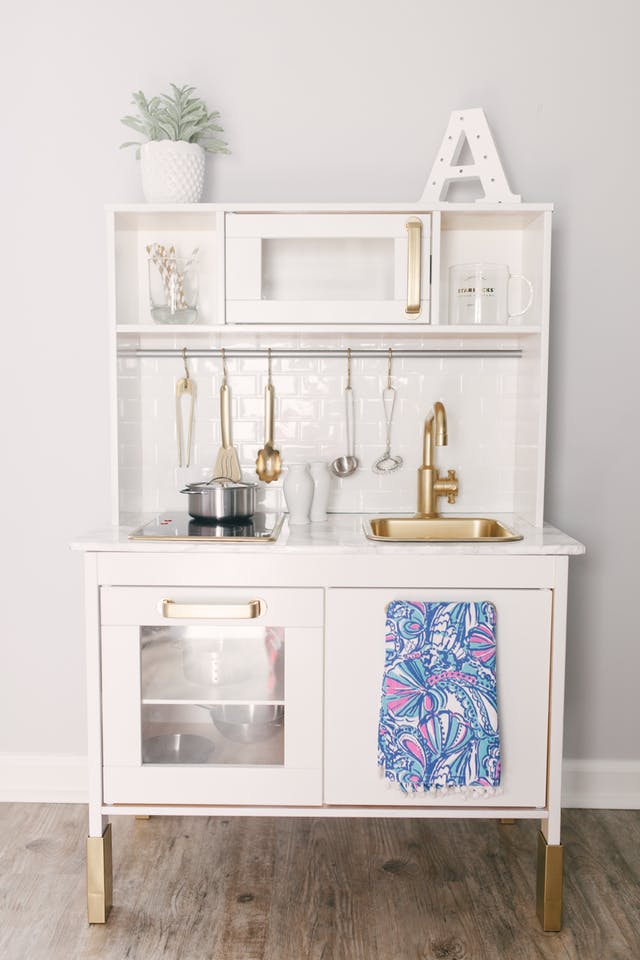 Ikea kitchen with gold accents