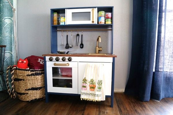 Ikea duktig play kitchen makeover with gold and navy paint