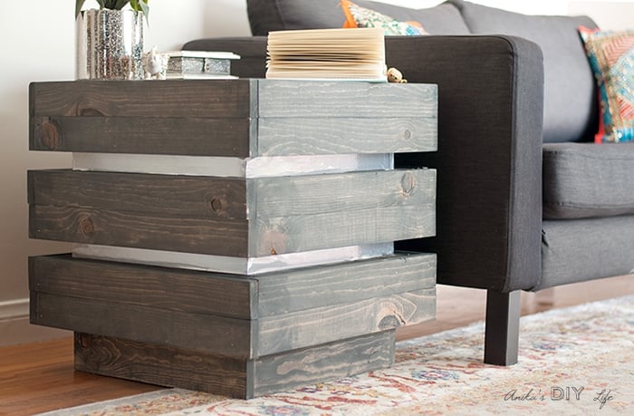 Chunky Tiered end table next to couch