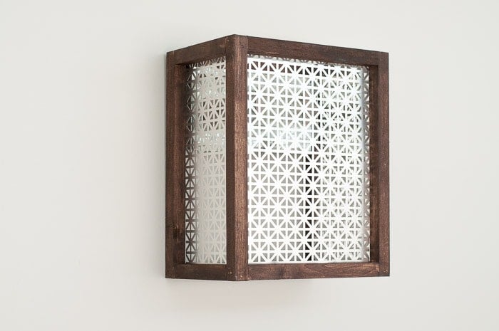 How to make a wall sconce. Completed Easy DIY Wood and metal wall sconce on the wall