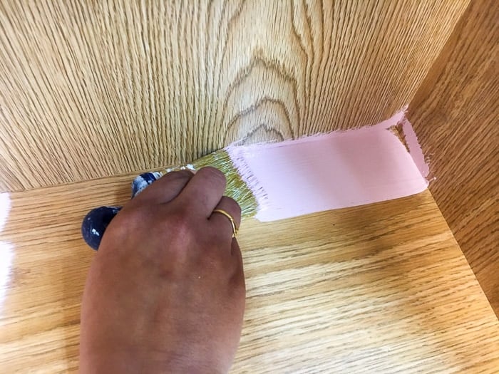 Painting inside of a bookshelf to create a DIY weathered barn wood bookshelf